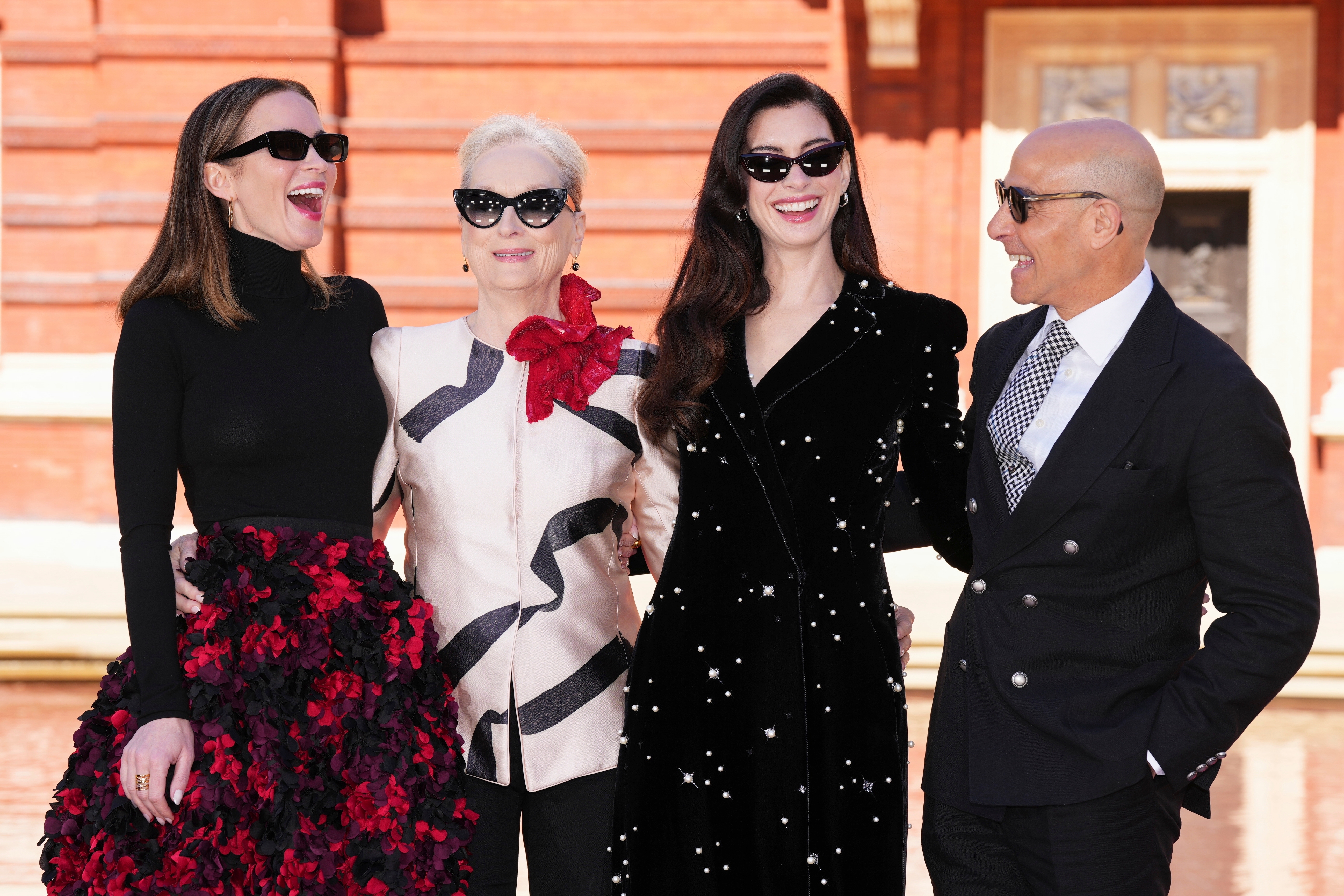 Emily Blunt, from left, Meryl Streep, Anne Hathaway and Stanley Tucci pose for photographers at the photo call for the film "The Devil Wears Prada 2" in London, Friday, April 24, 2026.